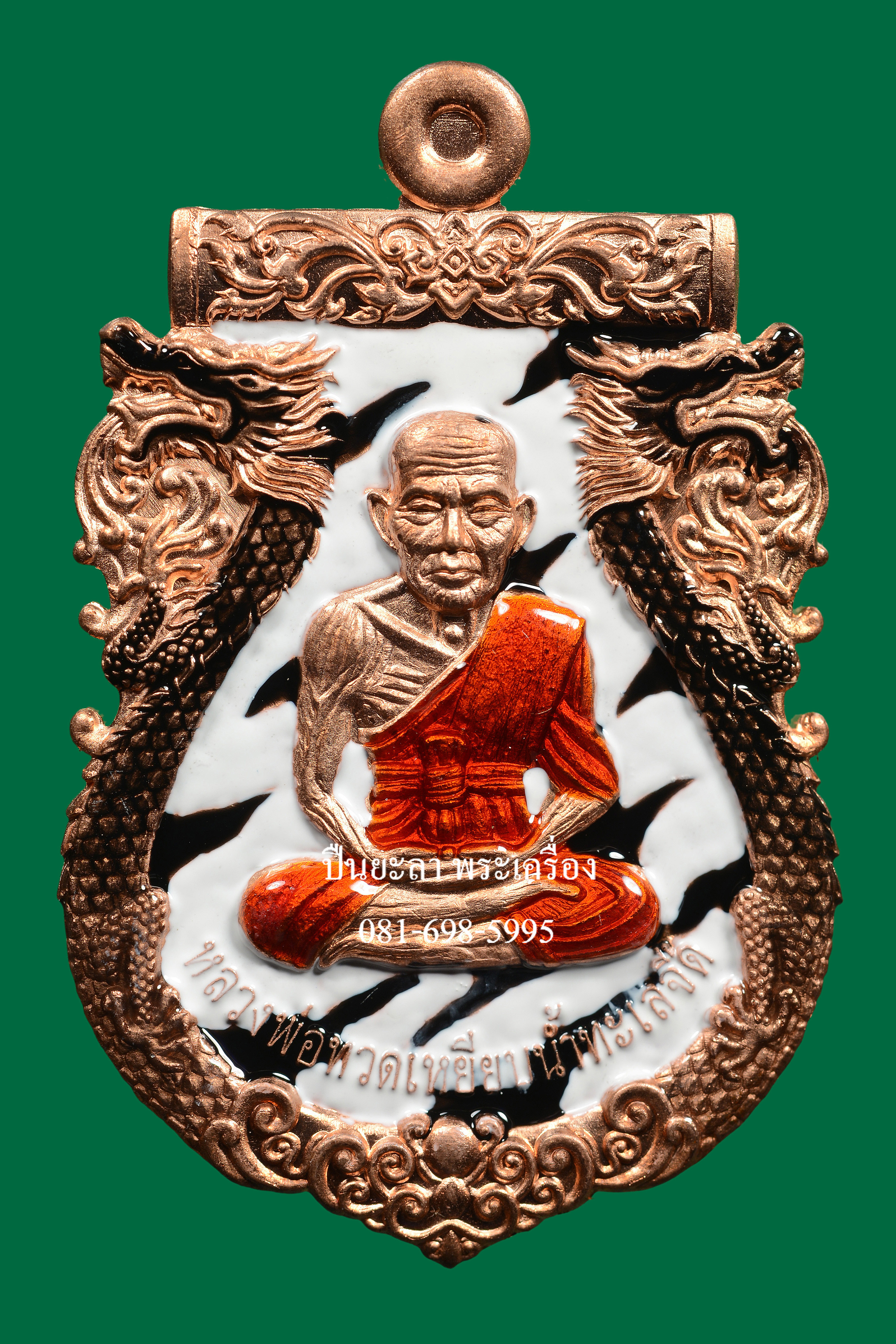 เหรียญปั๊มเสมาหลวงพ่อทวด พิมพ์หน้าเลื่อน หลังพญาครุฑ เนื้อทองแดงนอก ลงยาลายเสือขาวดำ รุ่นเลื่อนยศ เลื่อนตำแหน่ง ปี 2564 สวยงามมาก พร้อมกล่องเดิม