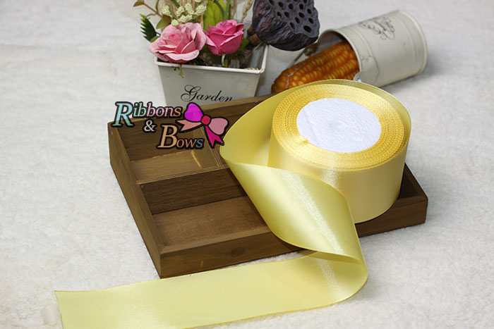 ริบบิ้นผ้าซาตินสีเหลือง ม้วน 25 หลาSA001