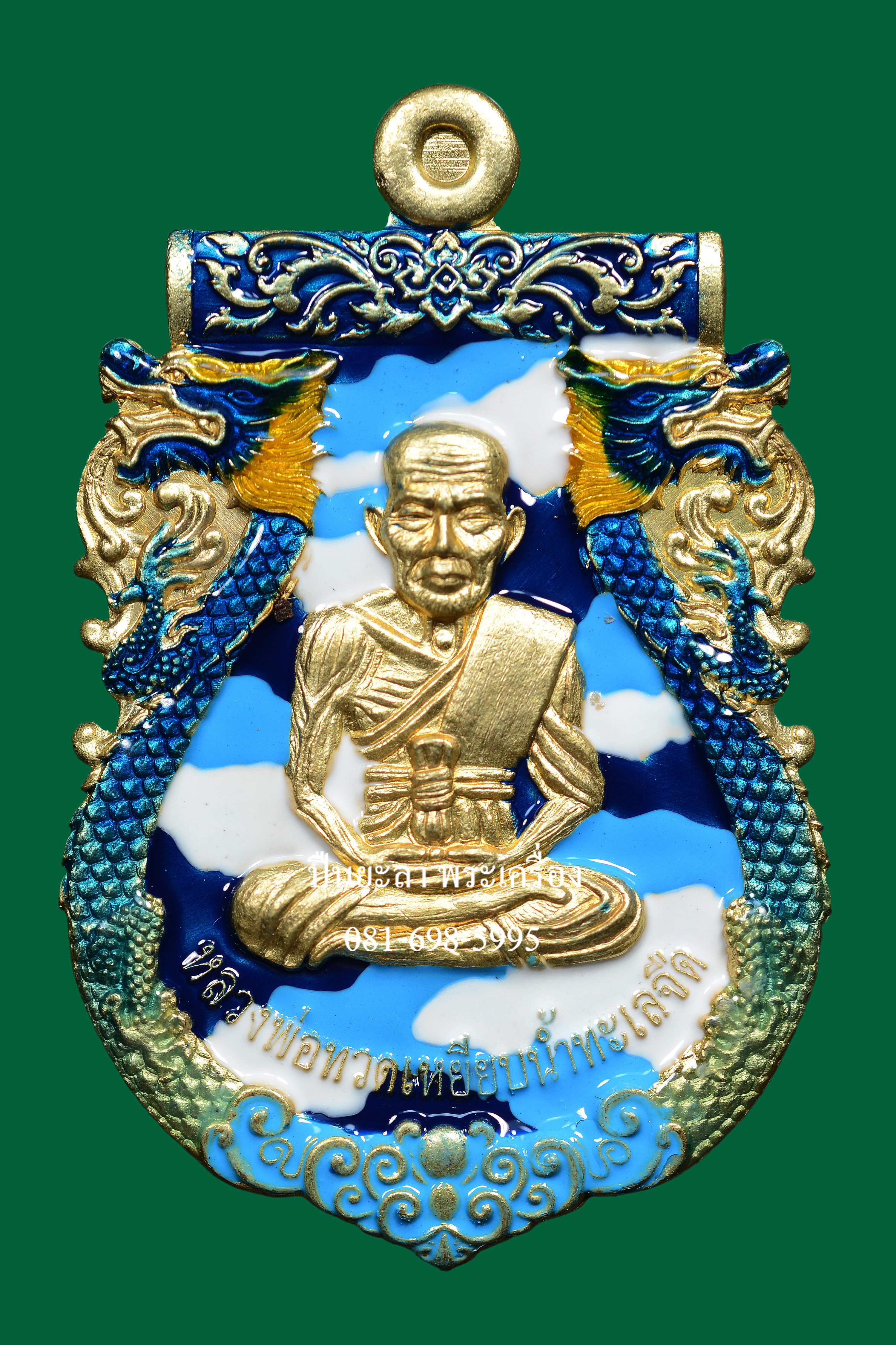 เหรียญปั๊มเสมาหลวงพ่อทวด พิมพ์หน้าเลื่อน หลังพญาครุฑ เนื้อทองทิพย์ลงยาลายพรางทหารอากาศ รุ่นเลื่อนยศ เลื่อนตำแหน่ง ปี 2564 สวยงามมาก พร้อมกล่องเดิม