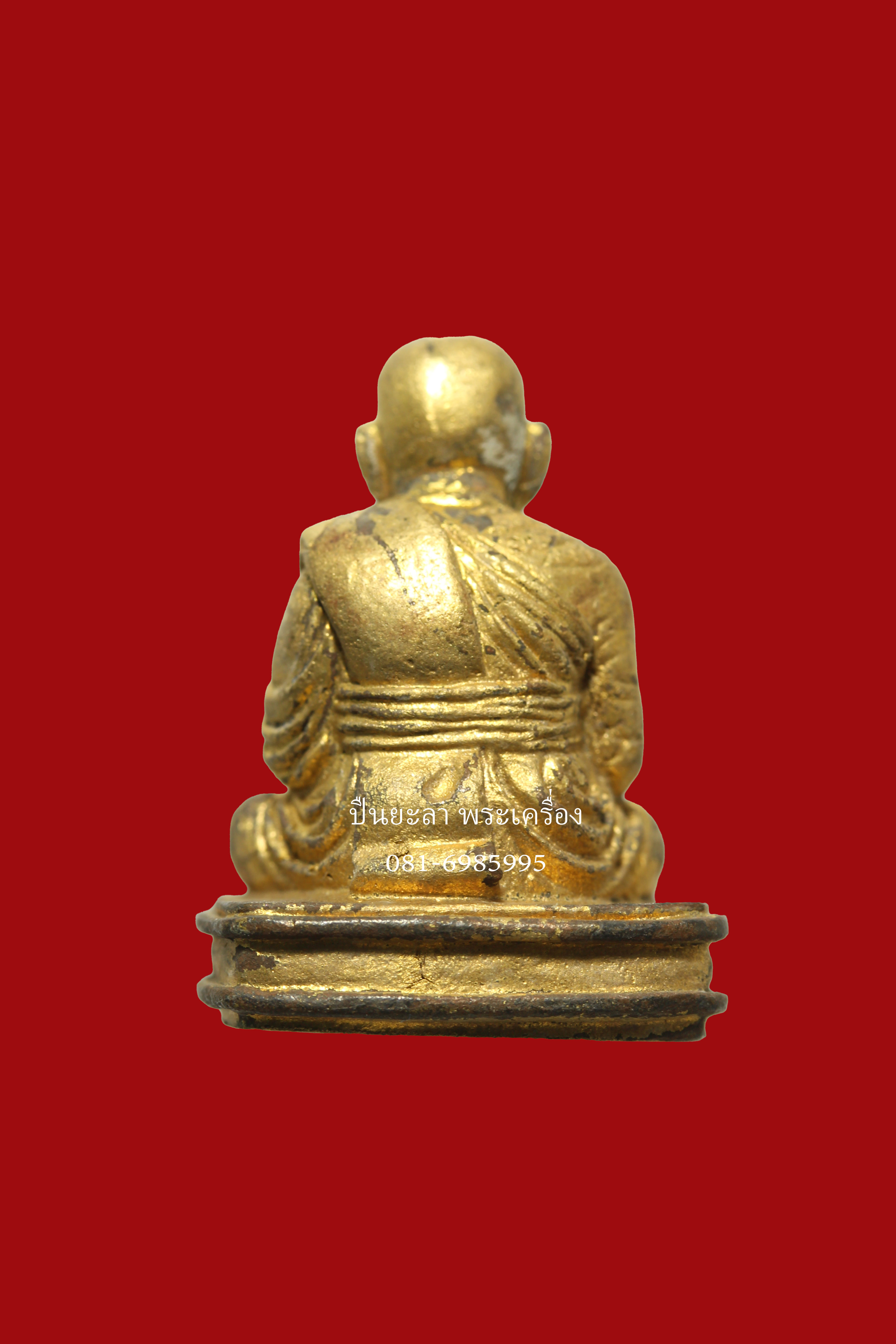รูปหล่อลอยองค์หลวงพ่อทวด เลขใต้ฐาน ตอกโค๊ตตัว 龍 เนื้อทองระฆัง รุ่นเททองรูปเหมือนหล่อหลวงพ่อทวด พ่อท่านพรหม วัดพลานุภาพ จ.ปัตตานี ปี 2555
