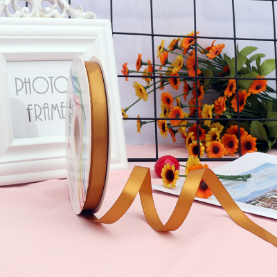 ริบบิ้นผ้าซาติน 2 หน้า สีทอง 50 หลา (Pale Gold)# WX032