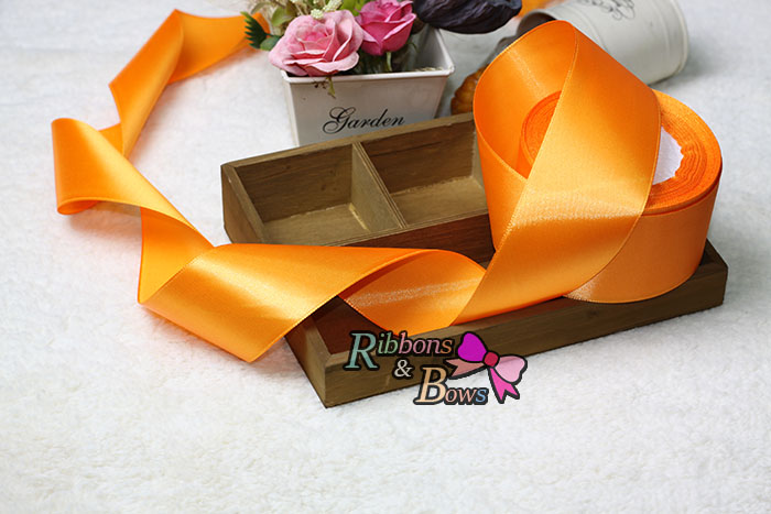 ริบบิ้นผ้าซาตินสีส้ม ม้วน 25 หลาSA016