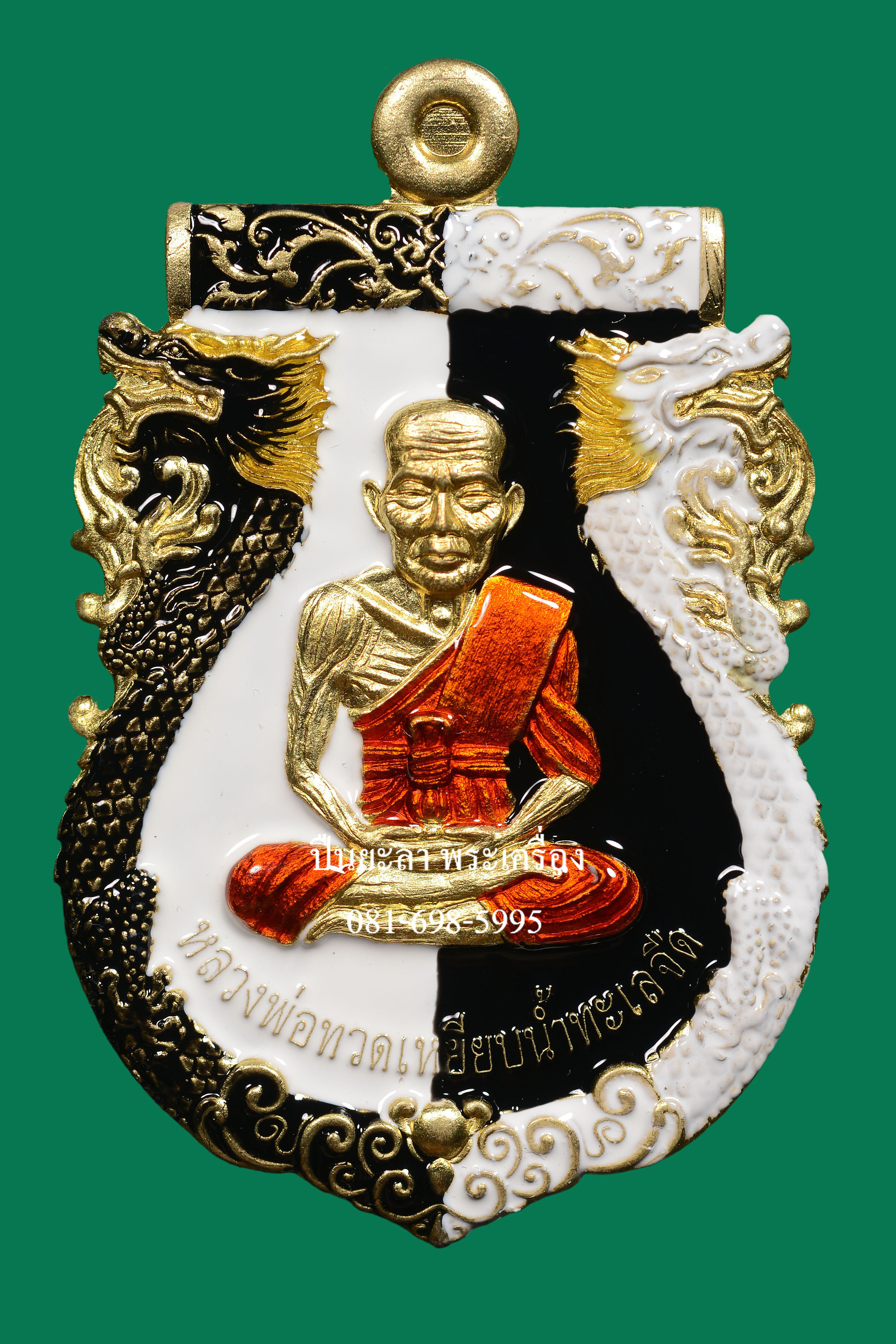 เหรียญปั๊มเสมาหลวงพ่อทวด พิมพ์หน้าเลื่อน หลังพญาครุฑ เนื้อทองทิพย์ ลงยาลายหยินหยาง รุ่นเลื่อนยศ เลื่อนตำแหน่ง ปี 2564 สวยงามมาก พร้อมกล่องเดิม