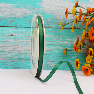 ริบบิ้นผ้าซาติน 2 หน้า สีเขียวเข้ม 50 หลา (Forest Green)# WX029