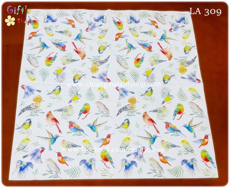 กระดาษแนปกิ้น ลายนกตัวเล็กหลายสี นกสีสันสดใสกำลังบินและเกาะกิ่งไม้ ใบไม้สีเขียว พื้นหลังสีขาว