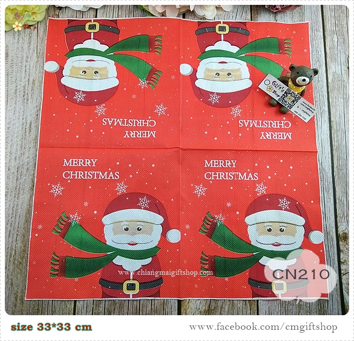 กระดาษแนปกิ้น, ลายซานตาคลอส, ลายซานต้า, ลายซานตาคลอสใส่ผ้าพันคอสีเขียว, ลายตัวอักษรคำว่า Merry christmas, ลายคริสต์มาส, ลายเทศกาล, ลายเกล็ดหิมะ, ลายฤดูหนาว, พื้นหลังสีแดง