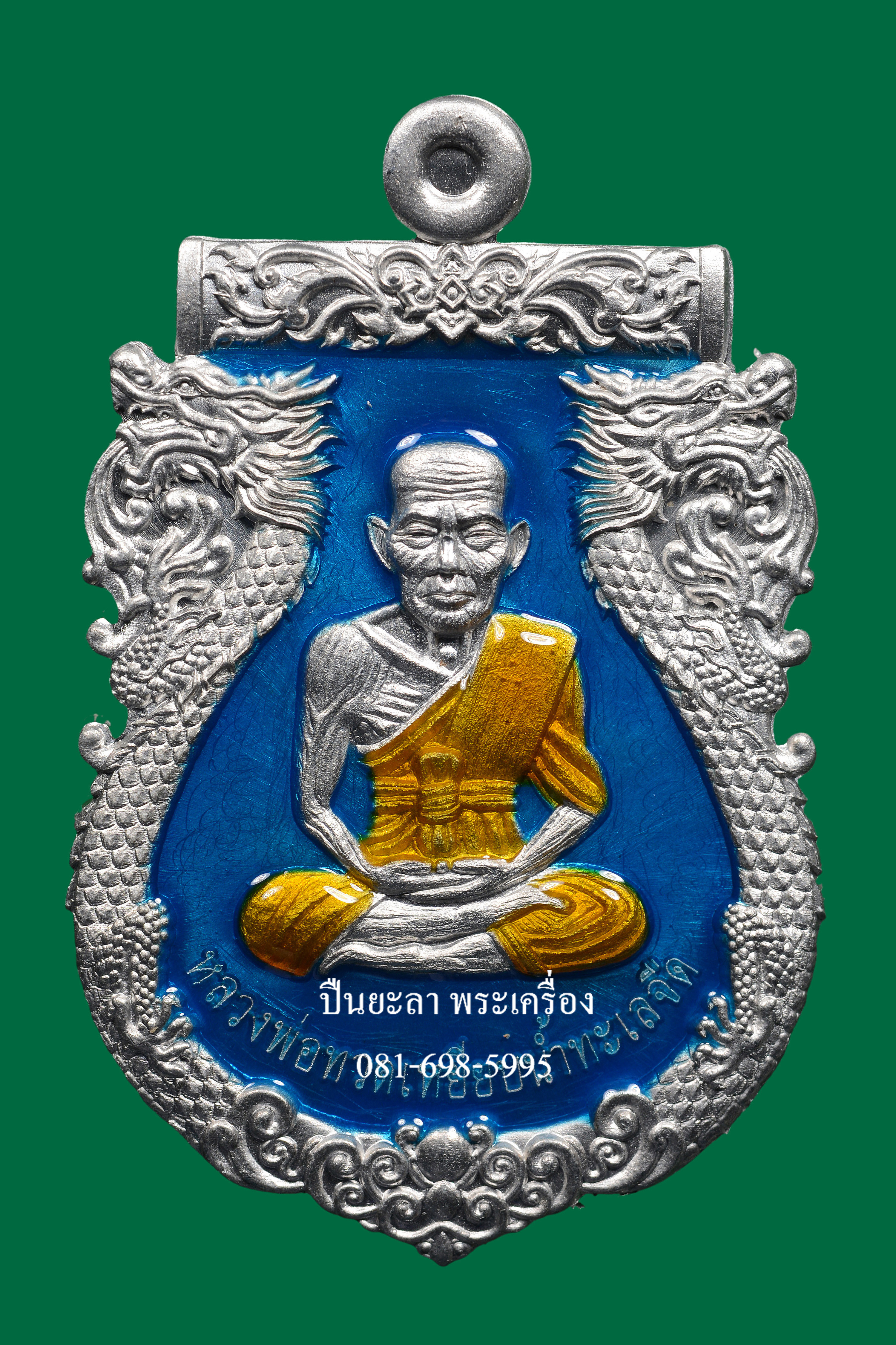 เหรียญปั๊มเสมาหลวงพ่อทวด พิมพ์หน้าเลื่อน หลังพญาครุฑ เนื้อปีกเครื่องบิน ลงยาสีฟ้า รุ่นเลื่อนยศ เลื่อนตำแหน่ง ปี 2564 สวยงามมาก พร้อมกล่องเดิม