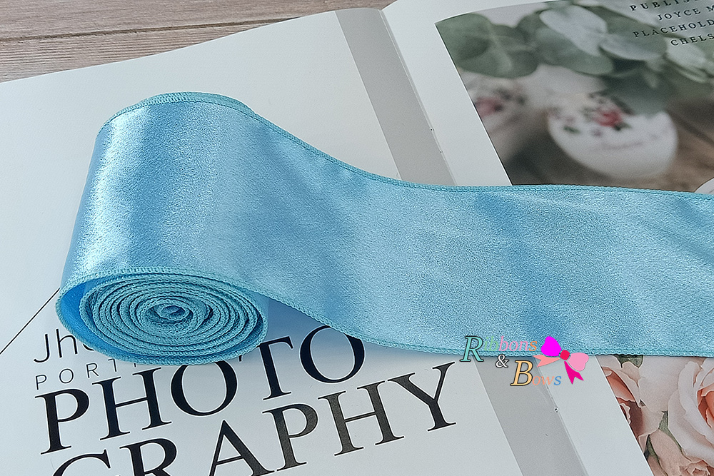 ริบบิ้นผ้าวาเลนติโน่ สีหวาน เย็บขอบ ขนาด 7 ซม.