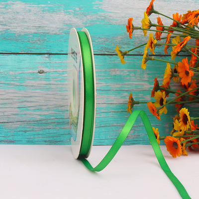 ริบบิ้นผ้าซาติน 2 หน้า สีเขียว 50 หลา (Classic Green)# WX028