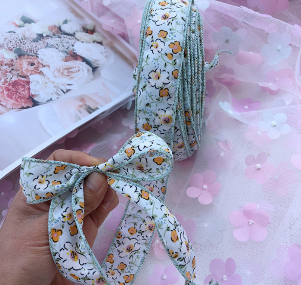 ริบบิ้นผ้าฝ้ายเย็บขอบ ลายดอก ขนาด 3 ซม. (ขายเป็นหลา) #FA14