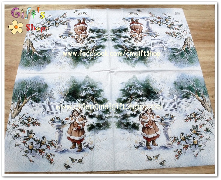 กระดาษแนปกิ้น ลายเด็กหญิงให้อาหารนกในสวนท่ามกลางหิมะ พื้นหลังสีขาว