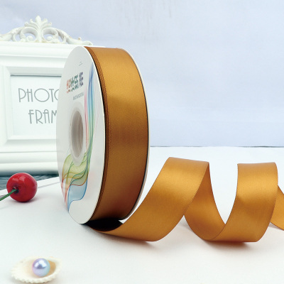 ริบบิ้นผ้าซาติน 2 หน้า สีทอง 50 หลา (Pale Gold)# WX032