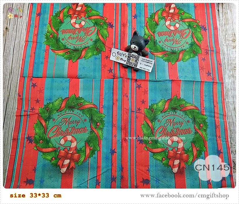 กระดาษแนปกิ้น, ลายพวงหรีดคริสต์มาส, ลายตัวอักษรคำว่า we wish you merry christmas, ลายดาว, ลายโทนสีเขียวแดง, ลายคริสต์มาส, ลายเทศกาลคริสต์มาส, พื้นหลังสีเขียวแดง