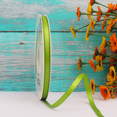 ริบบิ้นผ้าซาติน 2 หน้า สีเขียวอ่อน 50 หลา (Apple Green)# WX026