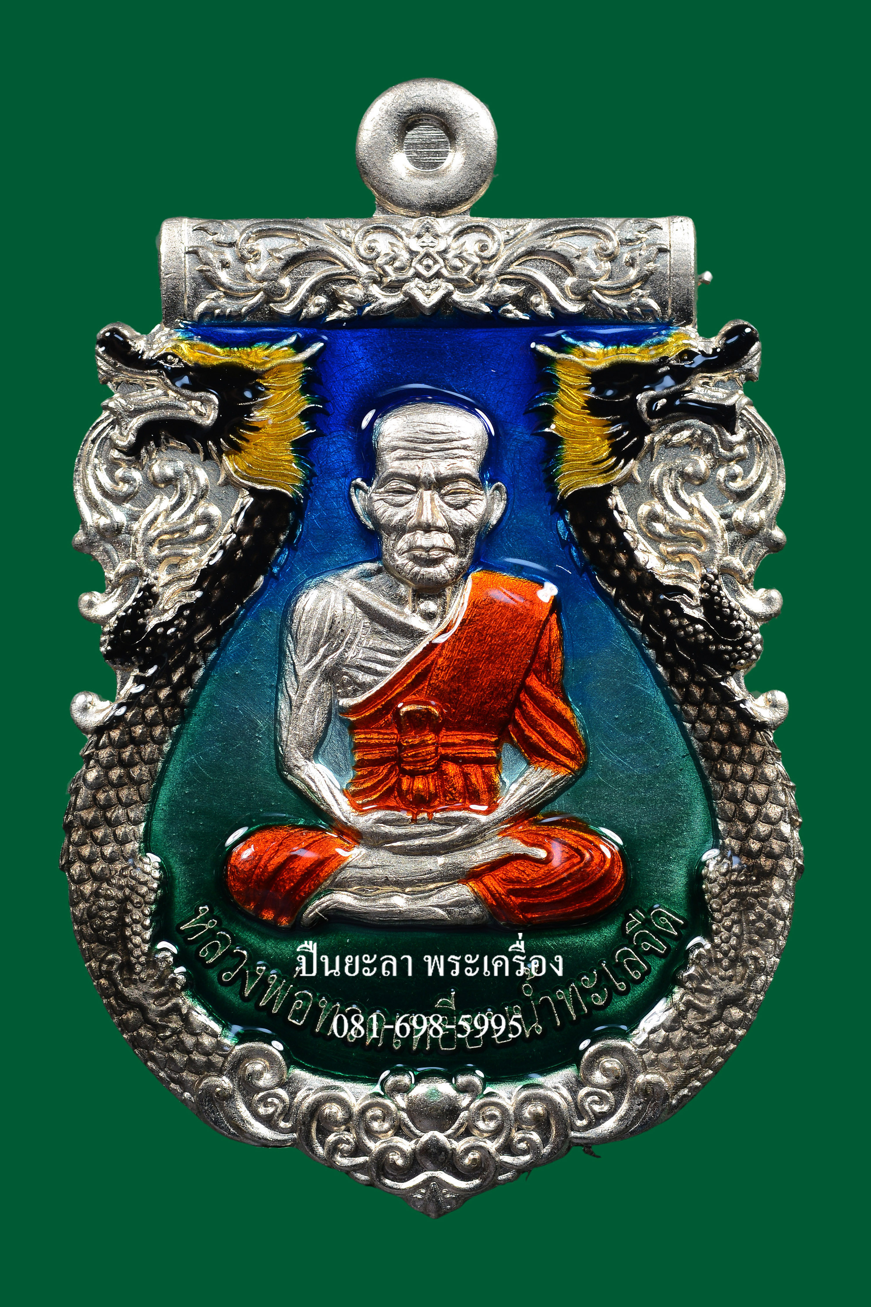 เหรียญปั๊มเสมาหลวงพ่อทวด พิมพ์หน้าเลื่อน หลังพญาครุฑ เนื้ออัลปาก้า ลงยาไล่สี น้ำเงิน ฟ้า เขียว รุ่นเลื่อนยศ เลื่อนตำแหน่ง ปี 2564 สวยงามมาก พร้อมกล่องเดิม