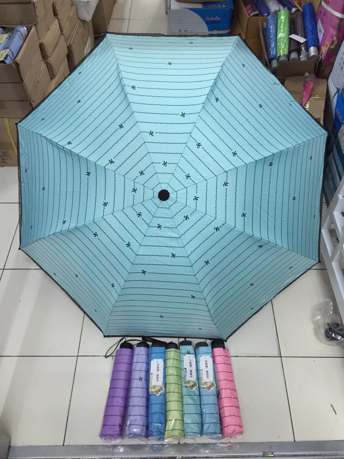 ร่ม4ตอน8ก้าน24นิ้วมีระบายยูวีดำ รหัส 1610