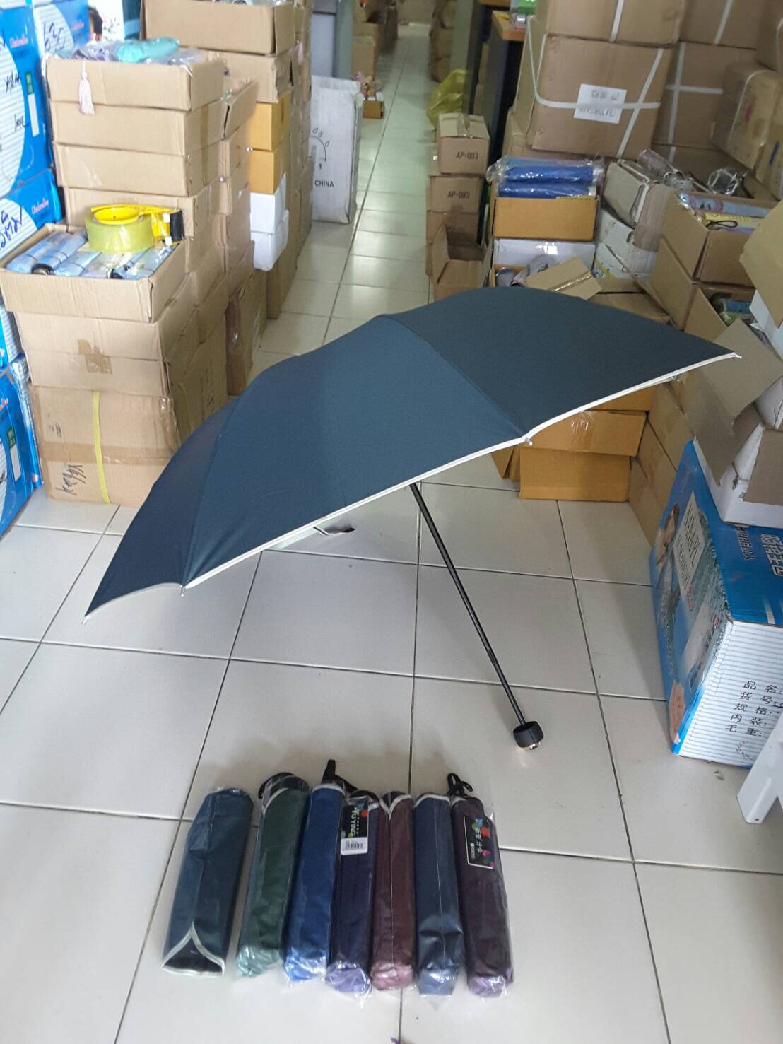 ร่มพับ3ตอนสีพื้นยูวีนอก