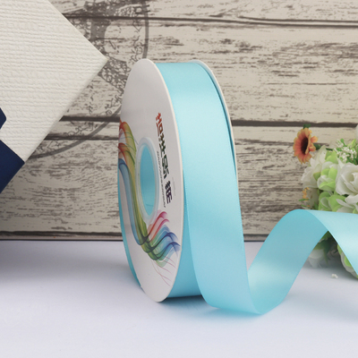 ริบบิ้นผ้าซาติน 2 หน้า สีฟ้าอ่อน 50 หลา (Light Blue)# WX018