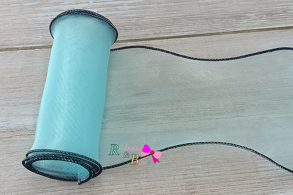 ริบบิ้นผ้าเย็บขอบสีดำ ผ้าไหมแก้ว ขนาด 10 ซม. (ขายเป็นหลา)