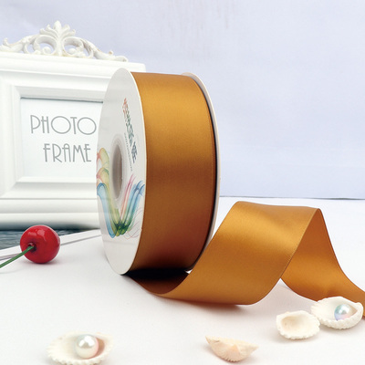 ริบบิ้นผ้าซาติน 2 หน้า สีทอง 50 หลา (Pale Gold)# WX032