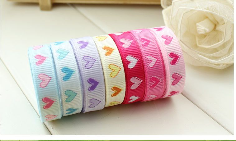 ริบบิ้นผ้าพิมพ์ลายหัวใจ กว้าง 10 mm มี 7 สี #HT6