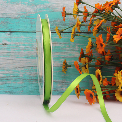 ริบบิ้นผ้าซาติน 2 หน้า สีเขียวอ่อน 50 หลา (Bud Green)# WX027