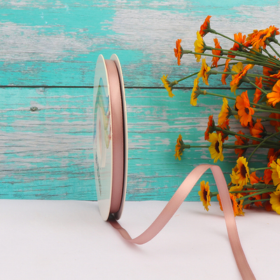 ริบบิ้นผ้าซาติน 2 หน้า สีน้ำตาลอ่อน 50 หลา (Vanilla)# WX033