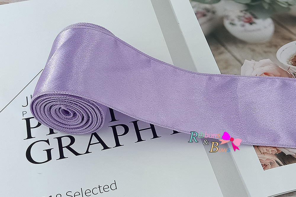 ริบบิ้นผ้าวาเลนติโน่ สีหวาน เย็บขอบ ขนาด 7 ซม.