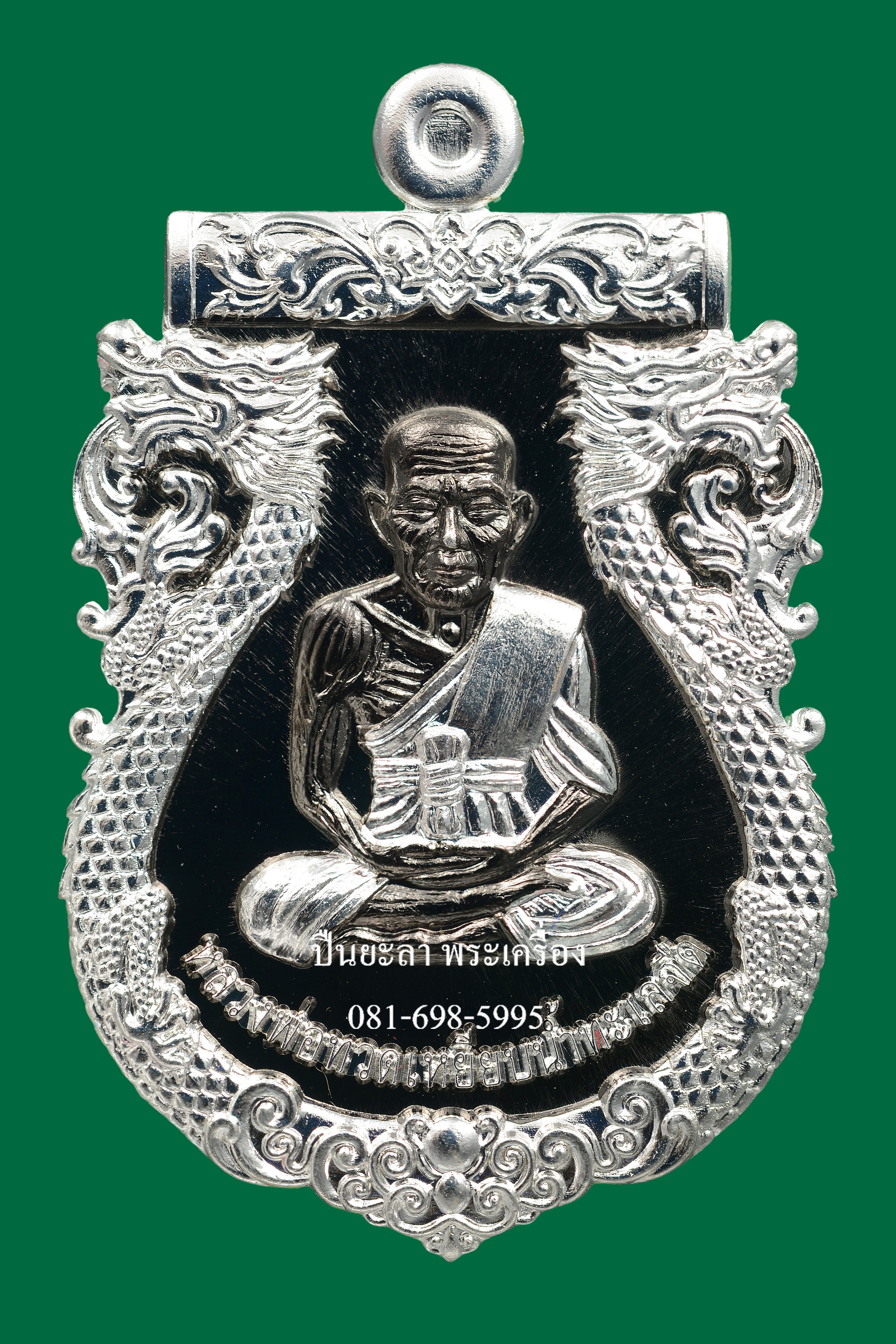 เหรียญปั๊มเสมาหลวงพ่อทวด พิมพ์หน้าเลื่อน หลังพญาครุฑ เนื้อแบล็คโรเดียน ลายเงิน รุ่นเลื่อนยศ เลื่อนตำแหน่ง ปี 2564 สวยงามมาก พร้อมกล่องเดิม
