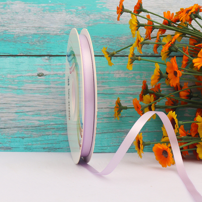 ริบบิ้นผ้าซาติน 2 หน้า สีม่วงอ่อน 50 หลา ( Light Orchid )# WX014