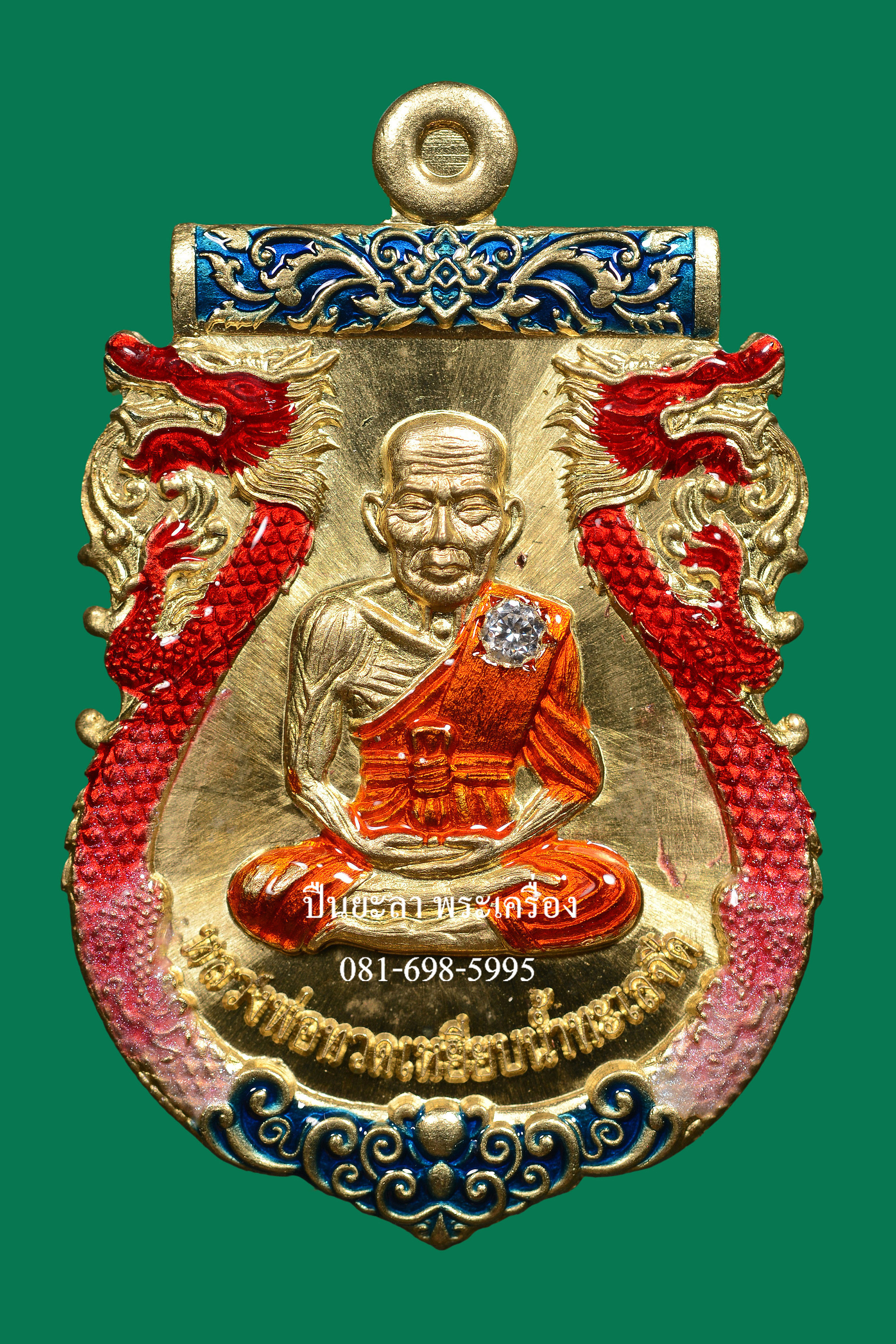เหรียญปั๊มเสมาหลวงพ่อทวด พิมพ์หน้าเลื่อน หลังพญาครุฑ เนื้อทองทิพย์ ลงยา ฝังเพชร รุ่นเลื่อนยศ เลื่อนตำแหน่ง ปี 2564 สวยงามมาก พร้อมกล่องเดิม