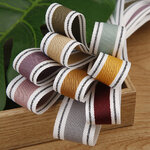 ริบบิ้นผ้า แต่งขอบ สีพาสเทล ขนาด 2.5 ซม.