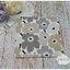 กระดาษแนปกิ้น ลายดอกไม้สีเทาน้ำตาลอ่อน ลายMINI UNIKOT linen ลายของ marimekko พื้นหลังสีขาว